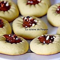 recette Biscuit au presse agrume à la crème de pistache et son coeur à la confiture de lait cacao et noisettes